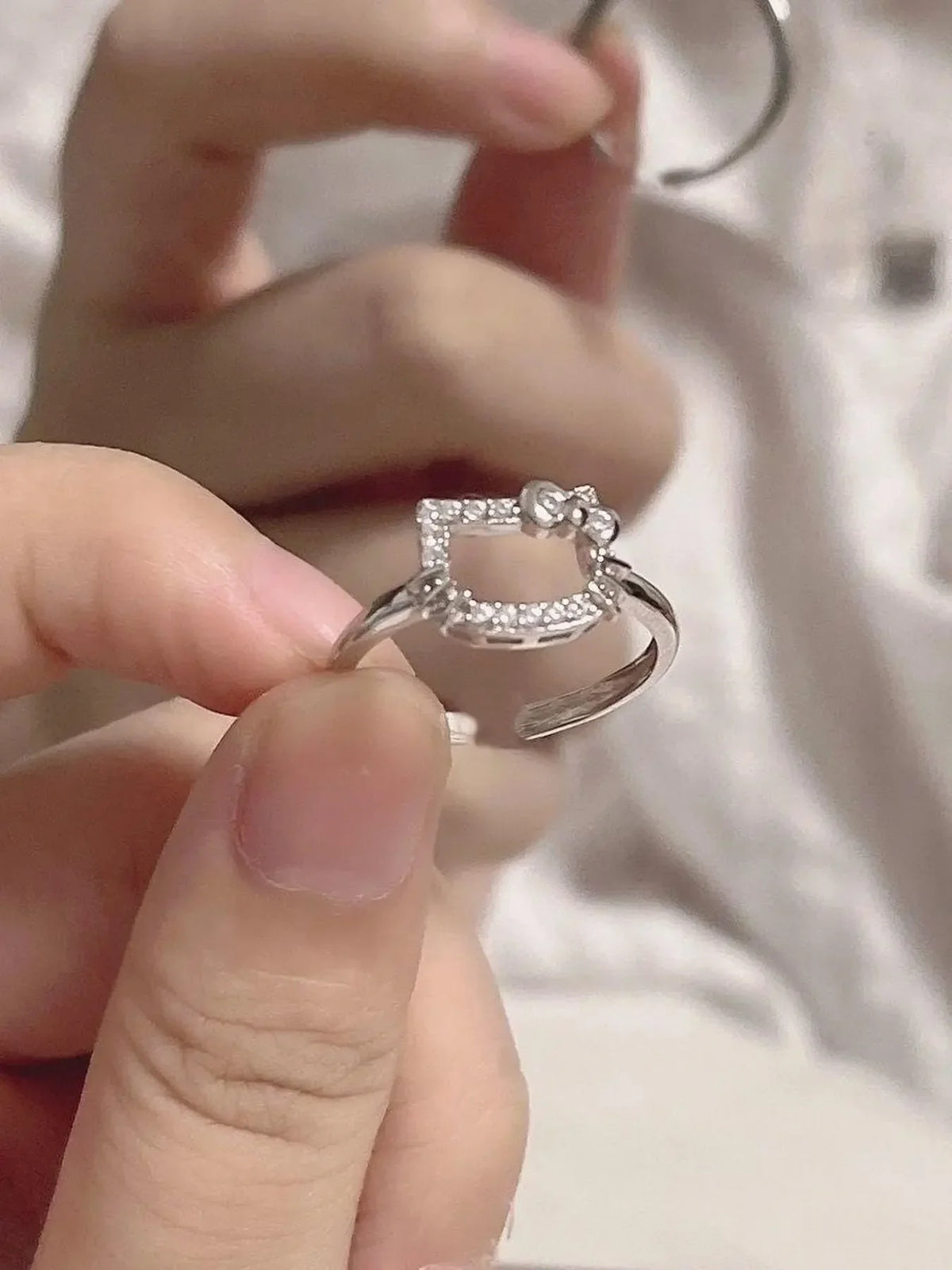 Hello Kitty cat face silver ring product photo