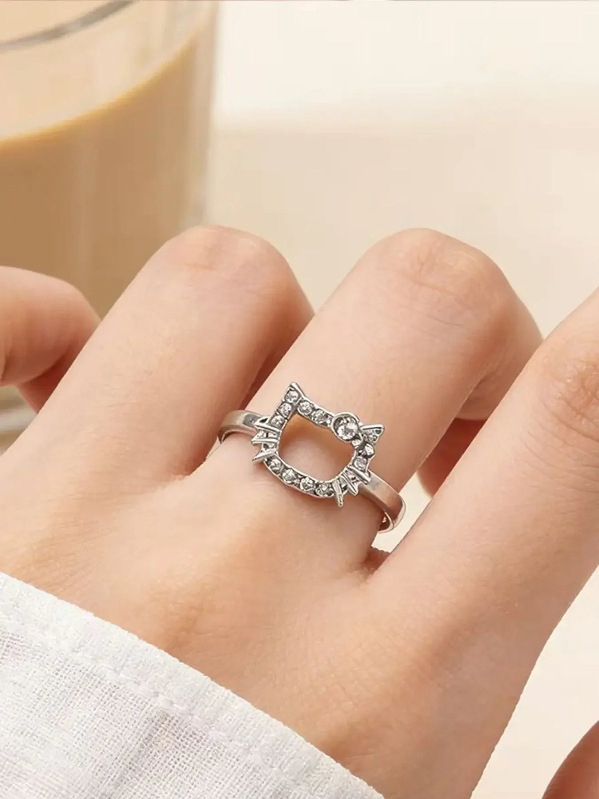 Hello Kitty cat face silver ring product photo